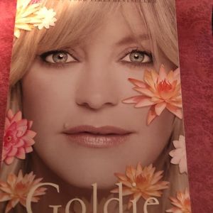 Goldie hawn a lotus grows in the mud paperback book